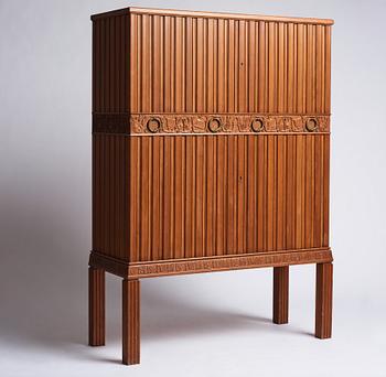 A Swedish Modern stained pine cabinet, 1940s.