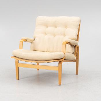 Bruno Mathsson, an 'Ingrid' armchair,  Dux, late 20th century.