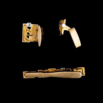 BJÖRN WECKSTRÖM, A TIECLIP AND A PAIR OF CUFFLINKS Crust of Ice, gold 14K with diamonds, Lapponia 1989.