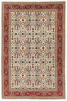A Hereke carpet, Turkey, c. 303 x 200cm.