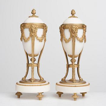 A pair of Louis XVI-style candlesticks, circa 1900.