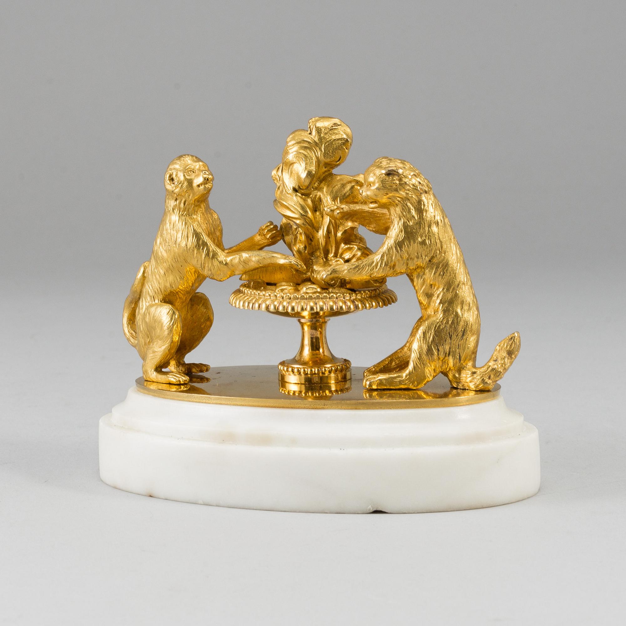 An ormolu and marble paperweight, France, first half of the 19th century.