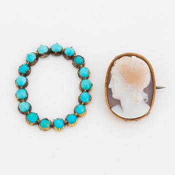 A hardstone cameo brooch with a detachable turquoise frame.