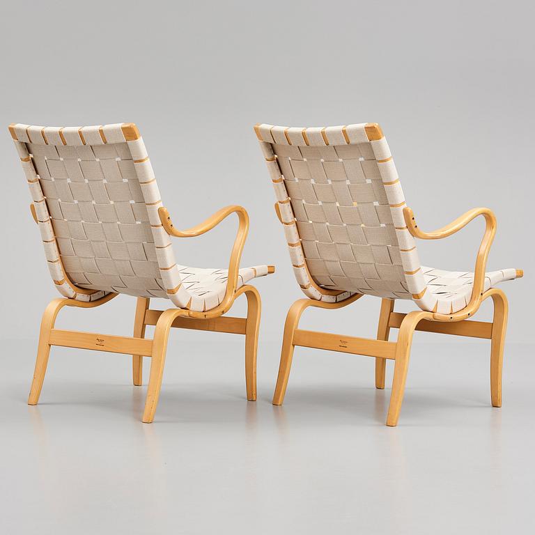 Bruno Mathsson, a pair of bent beech wood and textile girths 'Eva' lounge chairs, Firma Karl Mathsson, Sweden 1967.