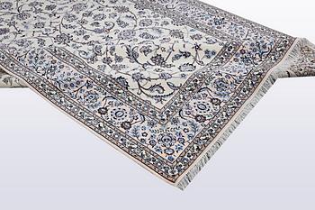 A carpet, Nain, part silk, 6 Laa, ca 301 x 203 cm.