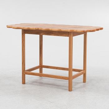 Josef Frank, an elm root top model 1058 coffee table from Firma Svenskt Tenn.