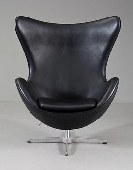 An Arne Jacobsen black leather and steel 'Egg Chair', Fritz Hansen, Denmark 2000.