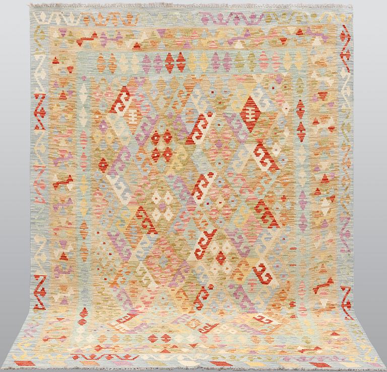 A Kilim carpet, ca 241 x 177 cm.