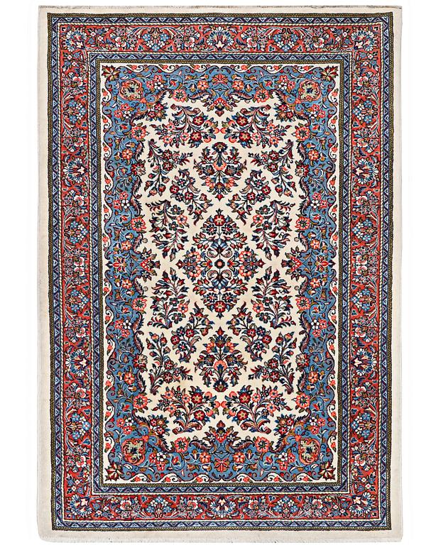 A rug, Sarouk, c. 210 x 137 cm.