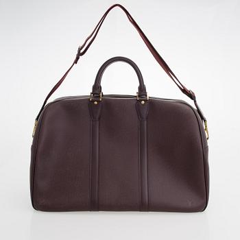 Louis Vuitton, 'Taiga Kendall PM' Bag.
