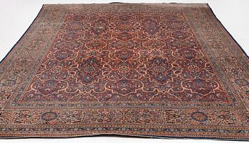 An oriental carpet, c. 425 x 305 cm.