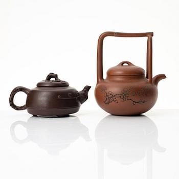Two Chinese yixing teapots, early 1900s and 1980s.