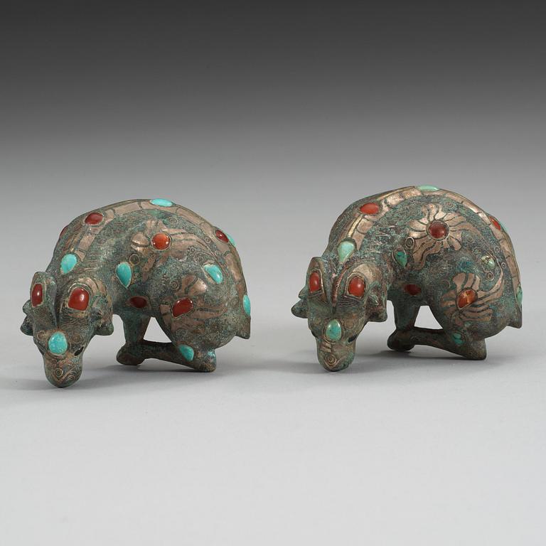 Two archaistic bronze weights with stone inlay, China.