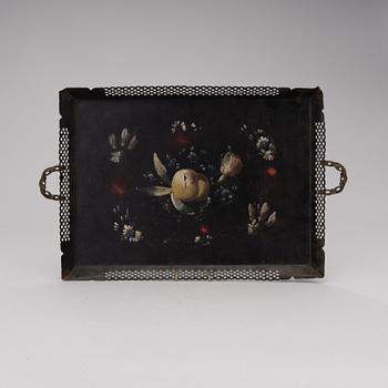 A painted metal tray from the 19th century.