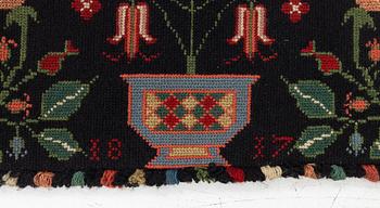 Åkdyna, korsstygnsbroderi, daterad 1817.
