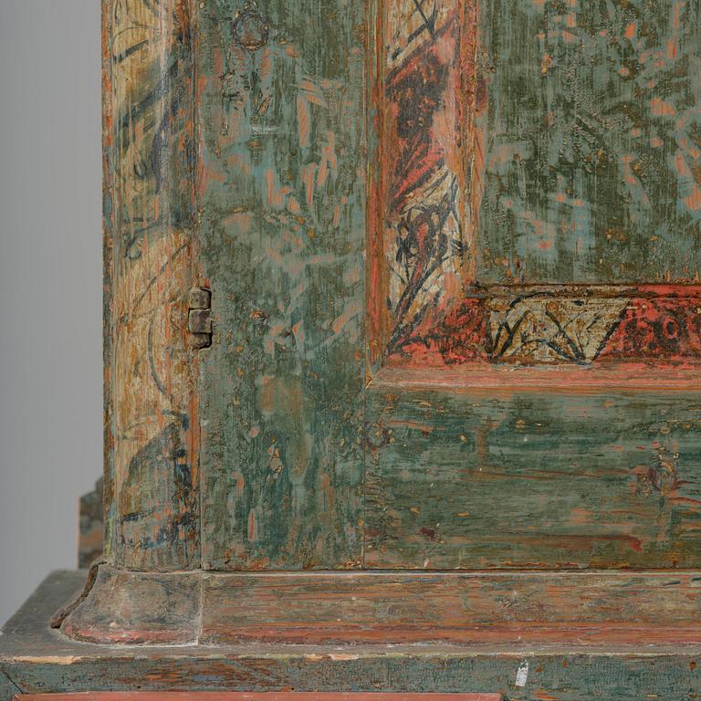 A Swedish polychrome-painted rococo cabinet, late 18th century.