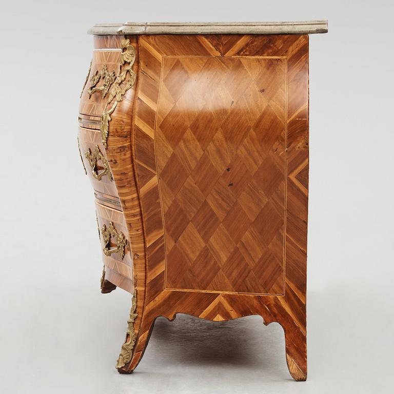 A rococo  gilt-brass mounted and rosewood parquetry commode by J. H. Reimers (master in Stockholm 1754-73).