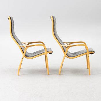 Yngve Ekström, a pair of 'Lamino' easy chairs, Swedese 2004.
