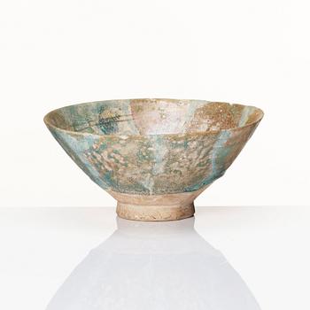 A 10-11th century Kashan Turquoise-glazed pottery bowl.