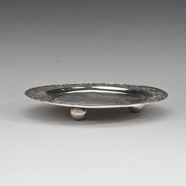 A silver salver decorated with bamboo Makers mark Zee Wo, Shanghai, early 20th century.