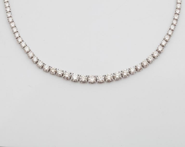 A line necklace with 104 brilliant cut diamonds total carat weight circa 25.44 cts. Quality circa G-H/VS-SI.