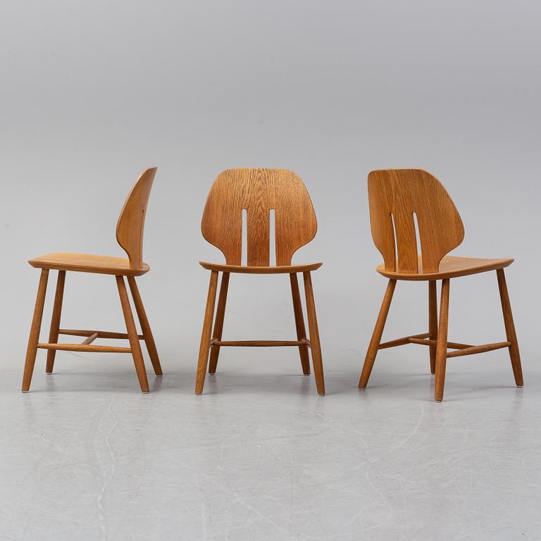 Three 'J 67' oak chairs by Ejvind A. Johansson, 1960's.
