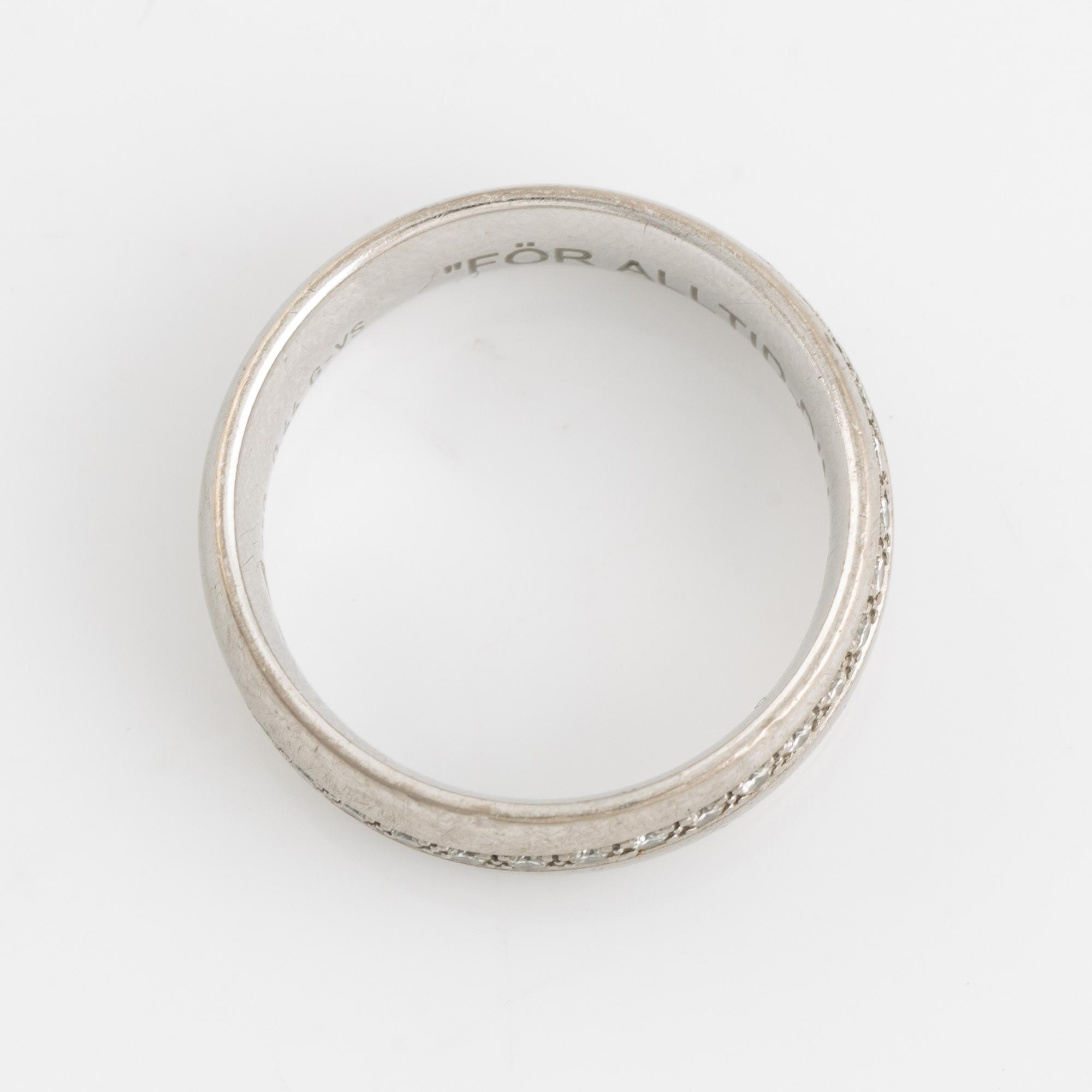 White gold and brilliant cut diamond ring.