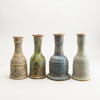 A group of 4 water pip bottles, Persia, presumably circa 1900.