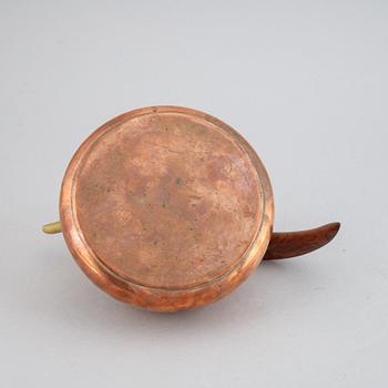 A copper, brass and rosewood teapot, Illums Bolighus, Denmark, 1950's.