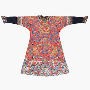 An embroidered red ground five clawed dragon 'female' formal robe, Qing dynasty, 19th century.