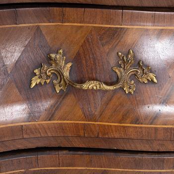 A Rococo chest of drawers, 18th century.