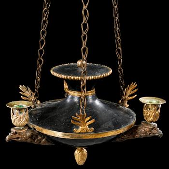 An empire three-branch chandelier, made in the first half of the 19th century.