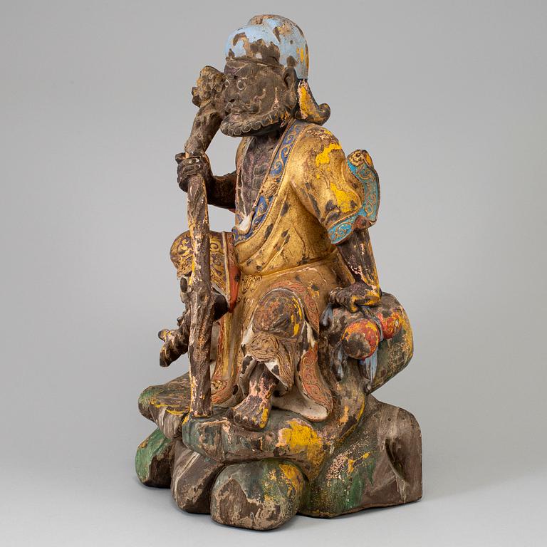 A Chinese wooden figure, 20th century.