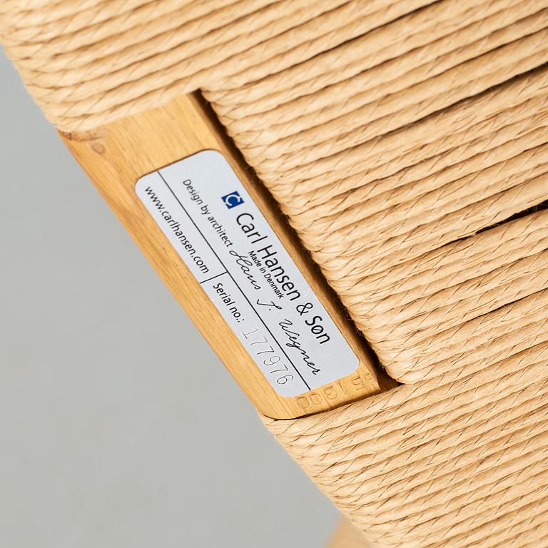 Four 21st century "Wishbone" armchairs by Hans J Wegner for Carl Hansen & Søn, Denmark.