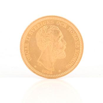 GULDMYNT, 20 kronor, Oscar II av Sverige och Norge 1884. Vikt ca 9 gram.