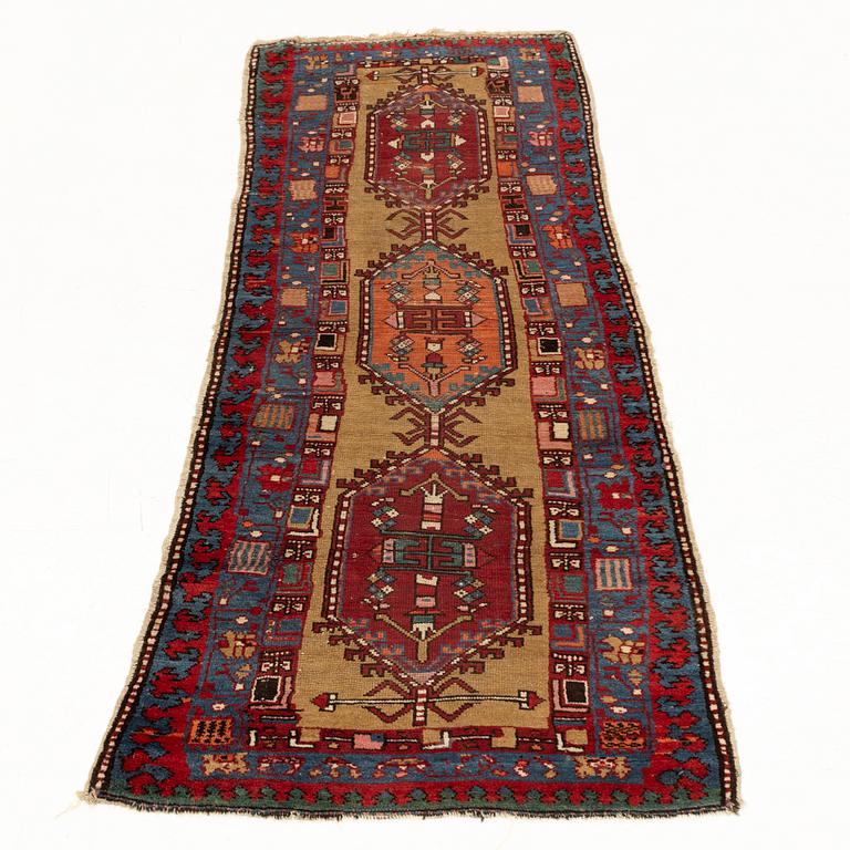 An antique Northwest Persian runner, c. 257 x 99 cm.