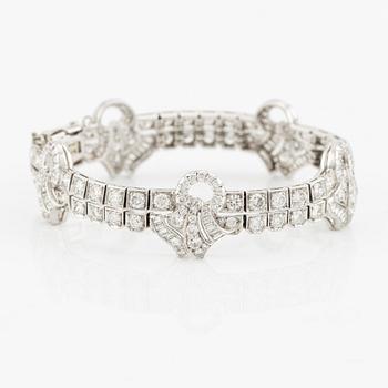 A platinum bracelet with round brilliant-, eight- and baguette-cut diamonds, Gübelin, founded in 1854.