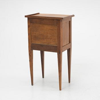 An early 19th Century nightstand.