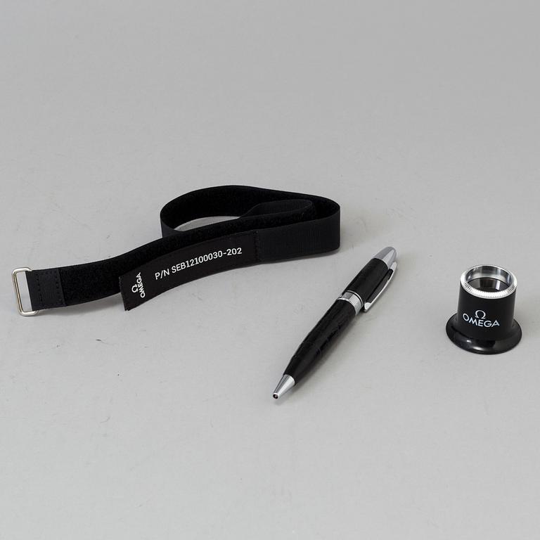 OMEGA, Pen / Loupe / Velcro strap.