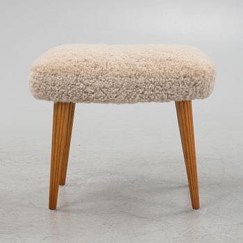 A sheepskin upholstered stool, mid 20th Century.