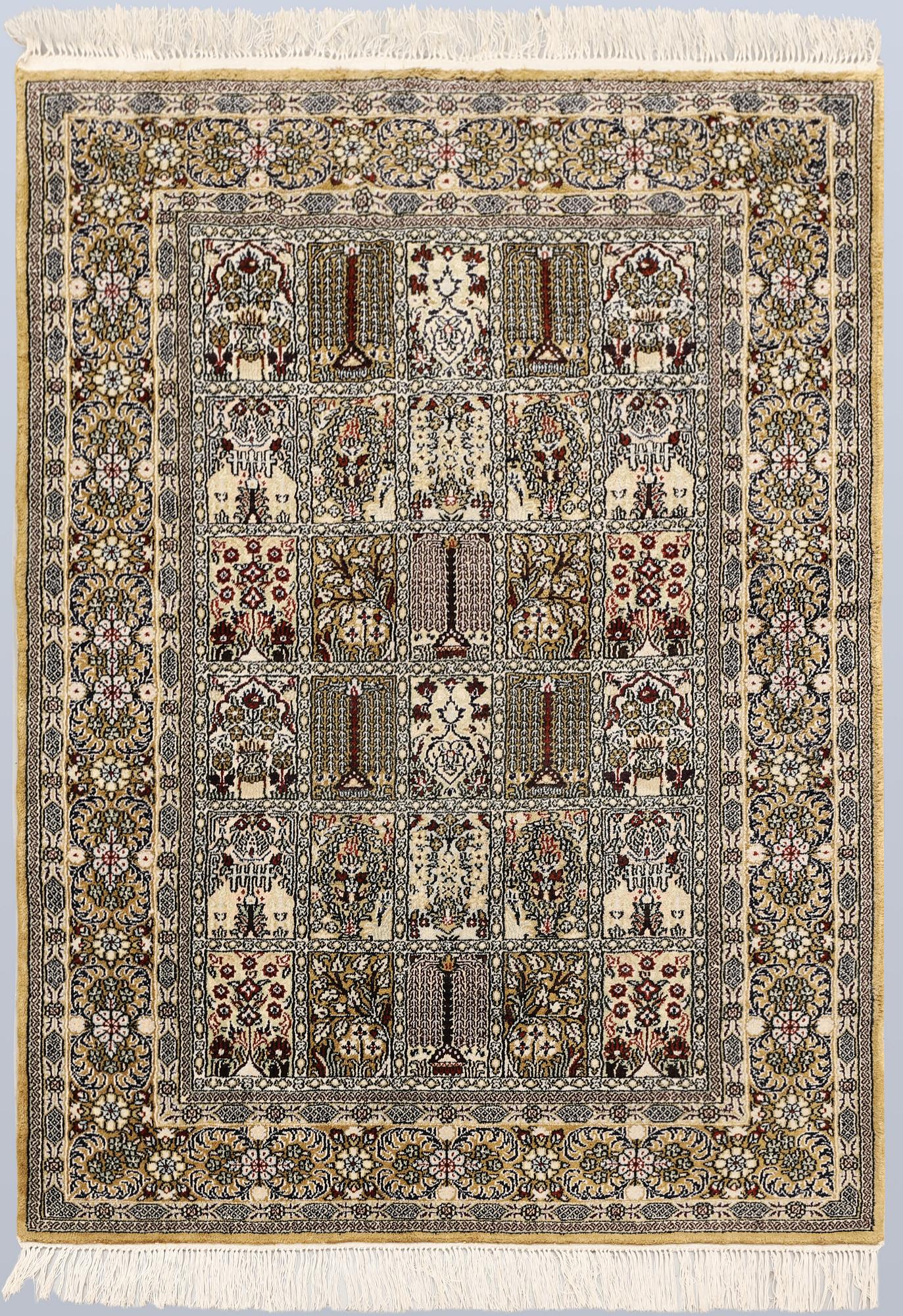 An Oriental silk rug, approx. 122 x 79 cm.
