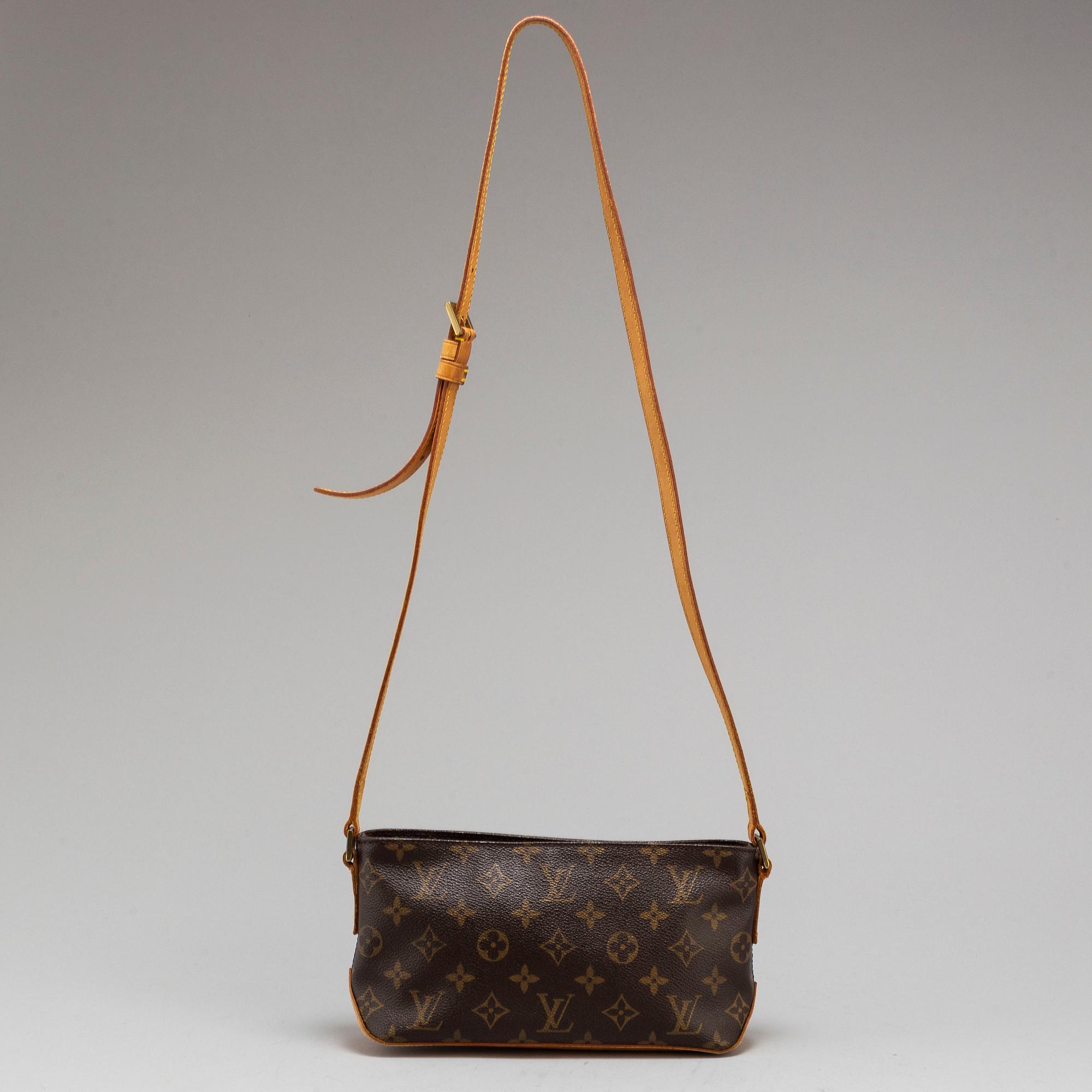 LOUIS VUITTON a Trotteur monogram canvas bag. Bukowskis