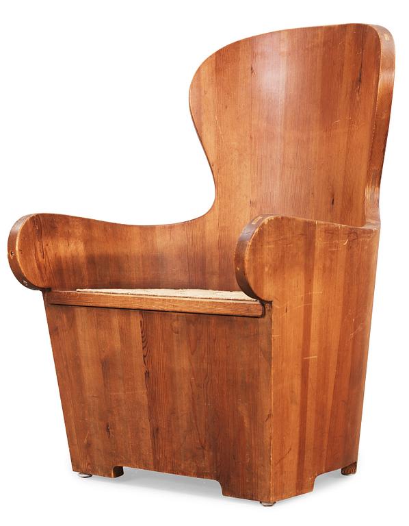 A stained pine armchair attributed to either Axel Einar Hjorth or David Rosén, Nordiska Kompaniet, ca 1932.