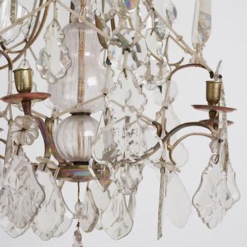 A Swedish rococo gilt-brass and cut glass six-branch chandelier by O. Westerberg (master in Stockholm 1769-1811).