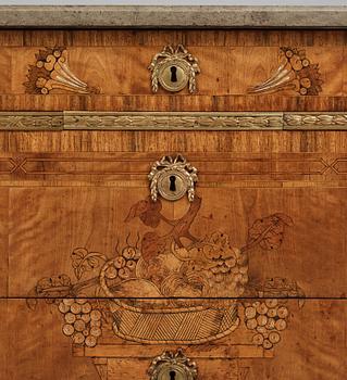 A matched pair of Gustavian ormolu-mounted limestone topped and marquetry commodes by C. Lindborg, late 18th century.