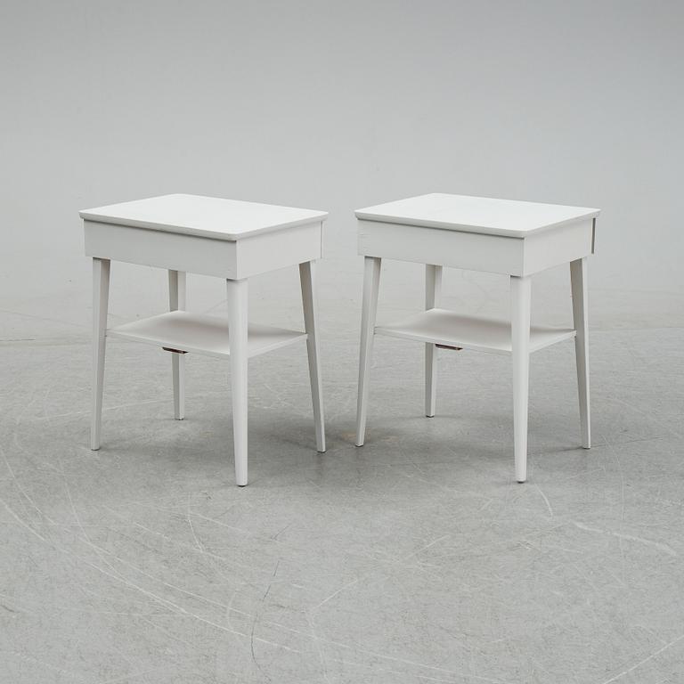 A pair of mid 20th century bedside tables.