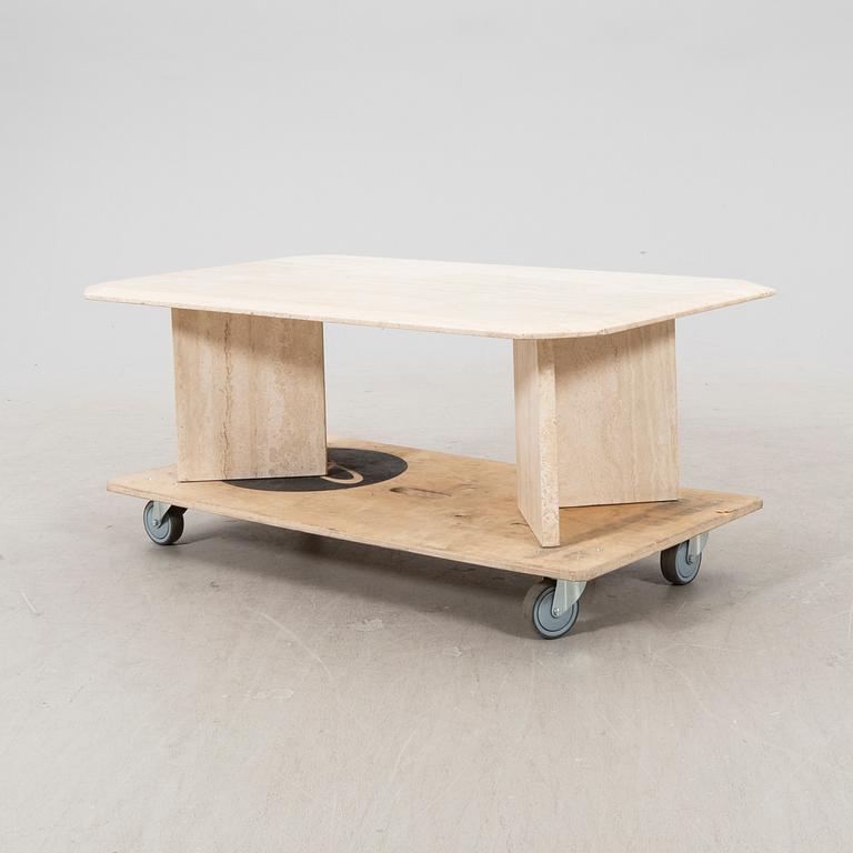 A late 20th century travertin  coffee table.