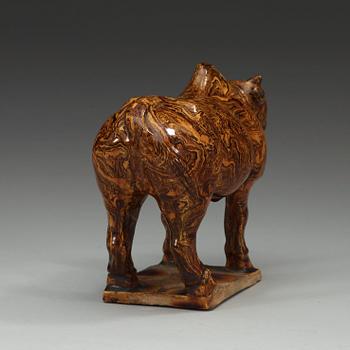 A marbled pottery figure of an ox, presumably Ming dynasty.