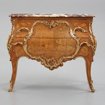 A Louis XV-style commode late 19th century.