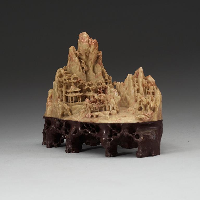 A Chinese soapstone sculpture of a landscape, 20th Century.